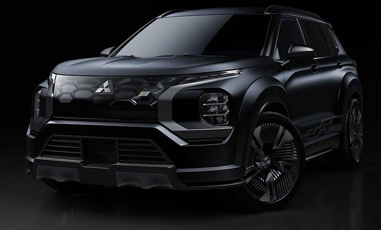 Camioneta Mitsubishi Vision Ralliart Concept vista frontal y lateral en fondo negro.